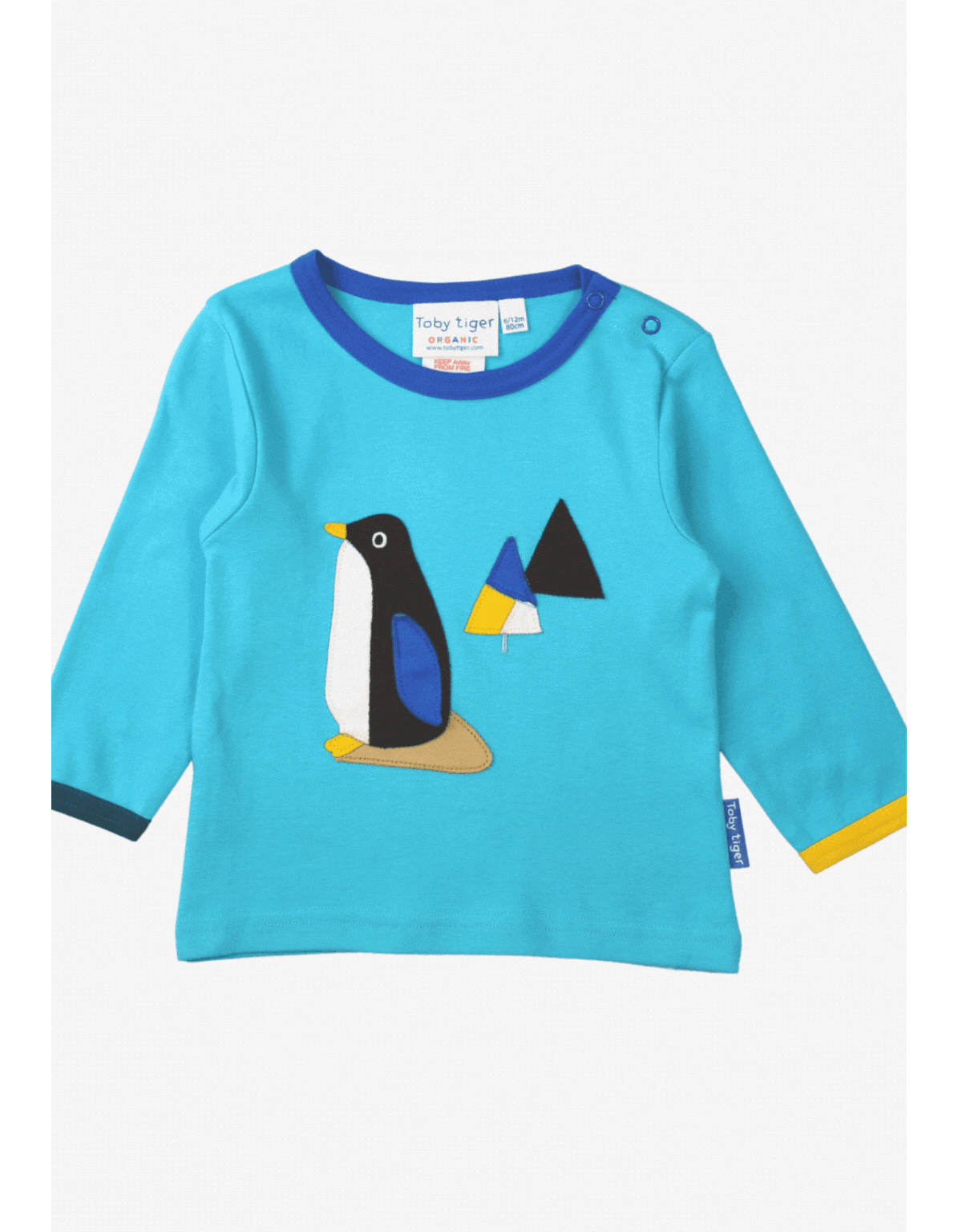 Organic cotton children's long-sleeved shirt with penguin appliqué