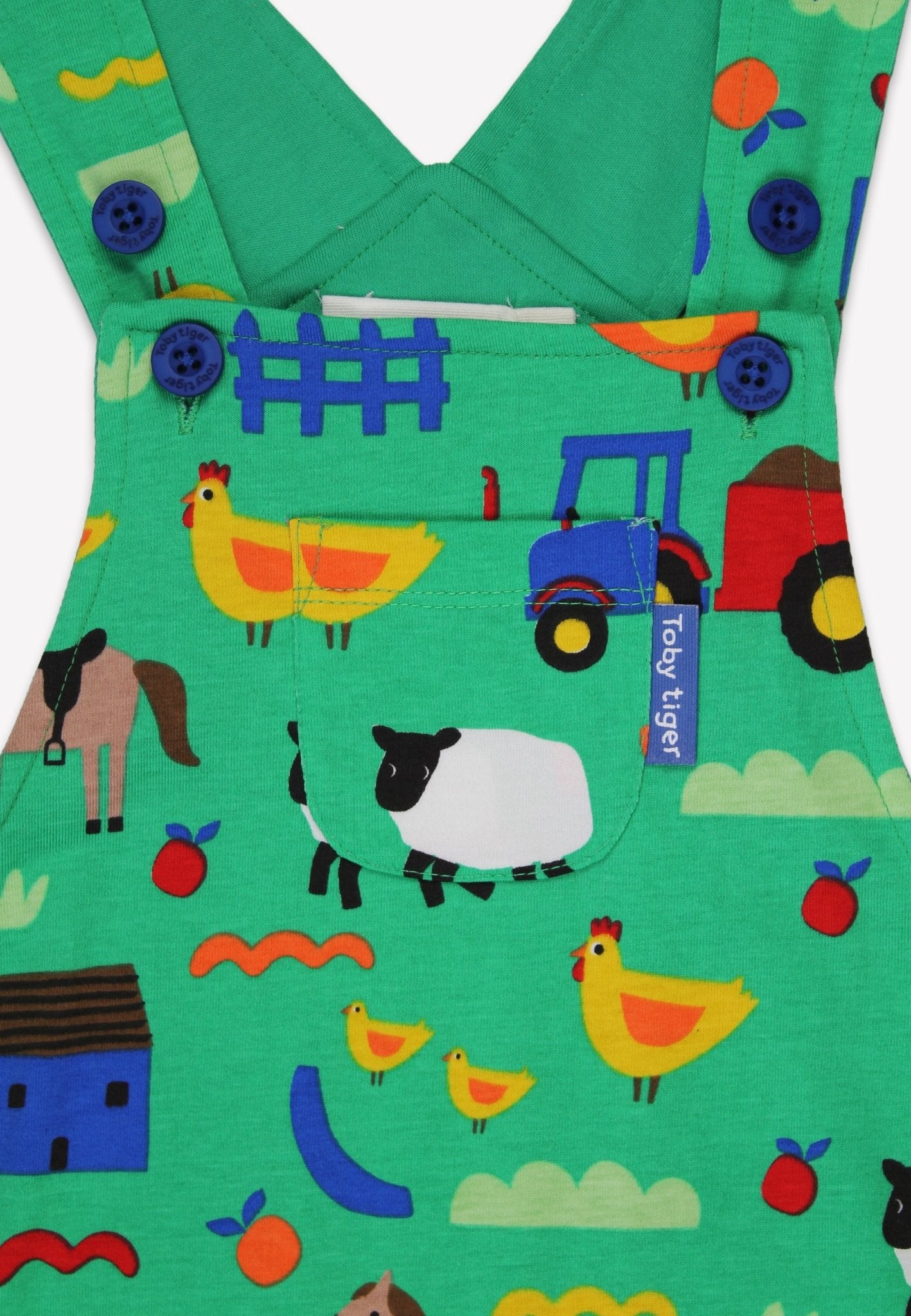 Bio - Baumwoll Kinder Latzhose mit Bauernhof - Druck - Toby Tiger GmbH