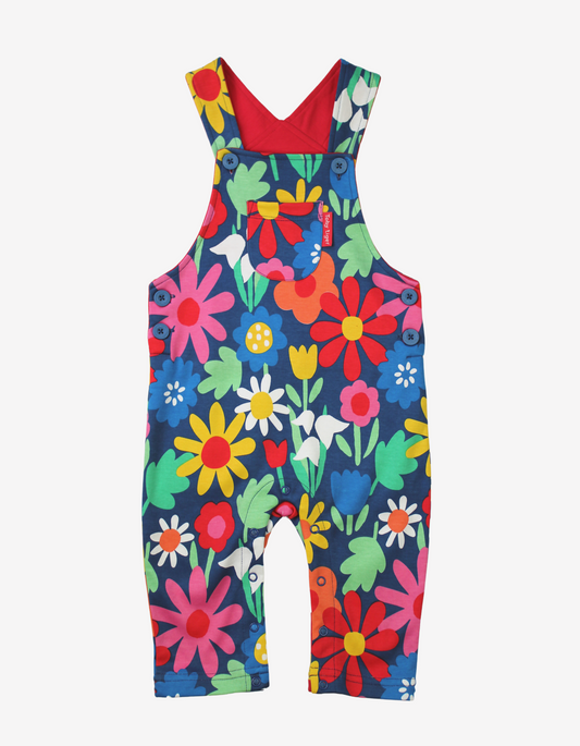 Organic cotton dungarees with eye-catching floral pattern