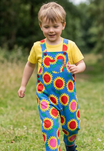 Bio-Baumwoll Kinder Latzhose mit Sonnenblumen-Meer-Druck