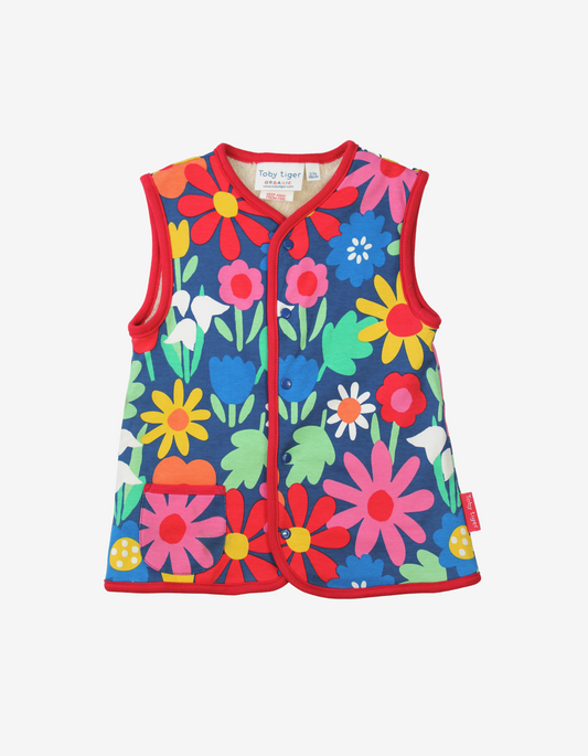 Reversible gilet made of organic cotton with striking floral pattern
