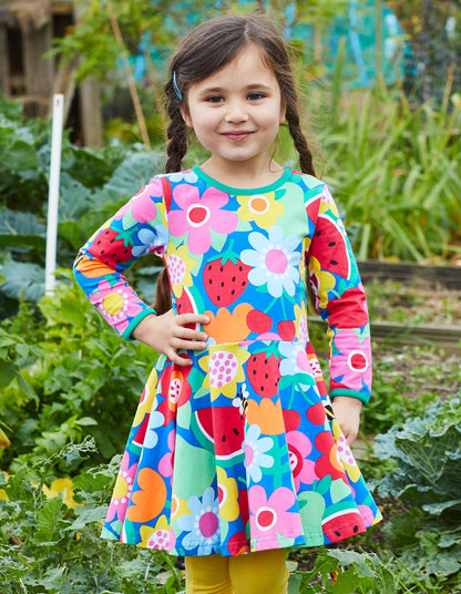 Kleid, langärmlig, Bio Baumwolle mit Obstblumenprint - Toby Tiger GmbH Retail