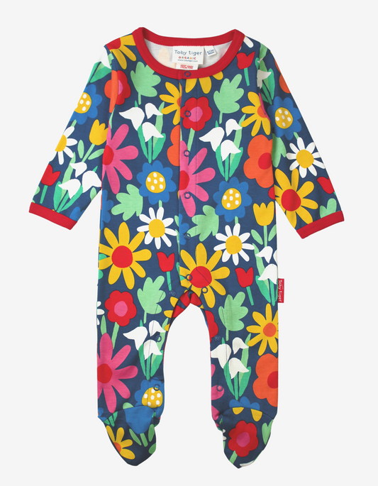 Organic cotton one-piece pajamas with eye-catching floral pattern
