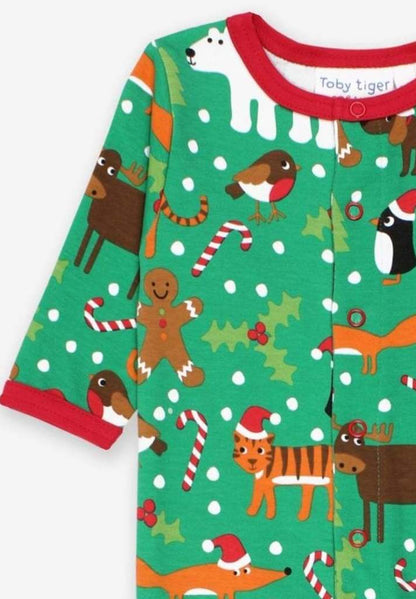 Schlafanzug aus Bio Baumwolle mit weihnachtlichem Print und Füßen - Toby Tiger GmbH