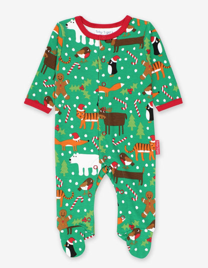 Schlafanzug aus Bio Baumwolle mit weihnachtlichem Print und Füßen - Toby Tiger GmbH Retail