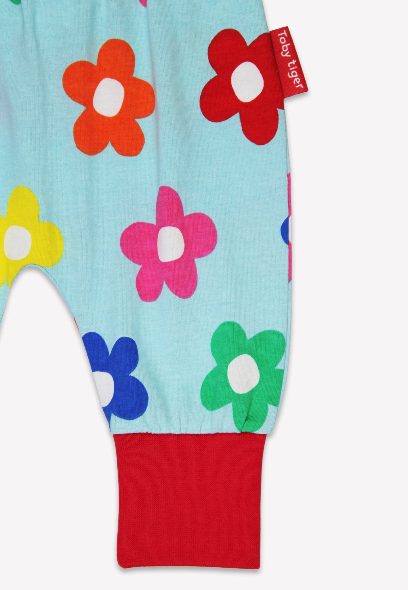 Bio - Baumwoll Baby Pumphose mit Regenbogenblumen - Druck - Toby Tiger GmbH