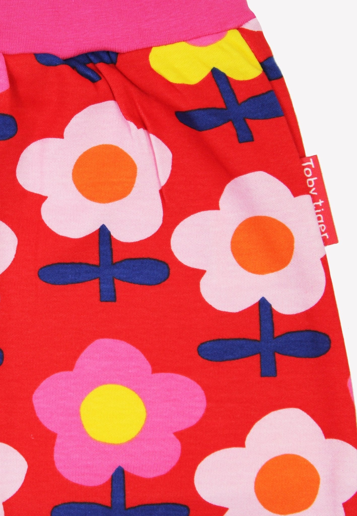 Bio - Baumwoll Kinder Schlupfhose mit Retro Blumen - Druck - Toby Tiger GmbH