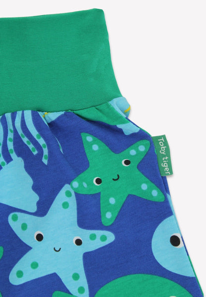 Bio - Baumwoll Kinder Schlupfhose mit Fisch - Druck - Toby Tiger GmbH