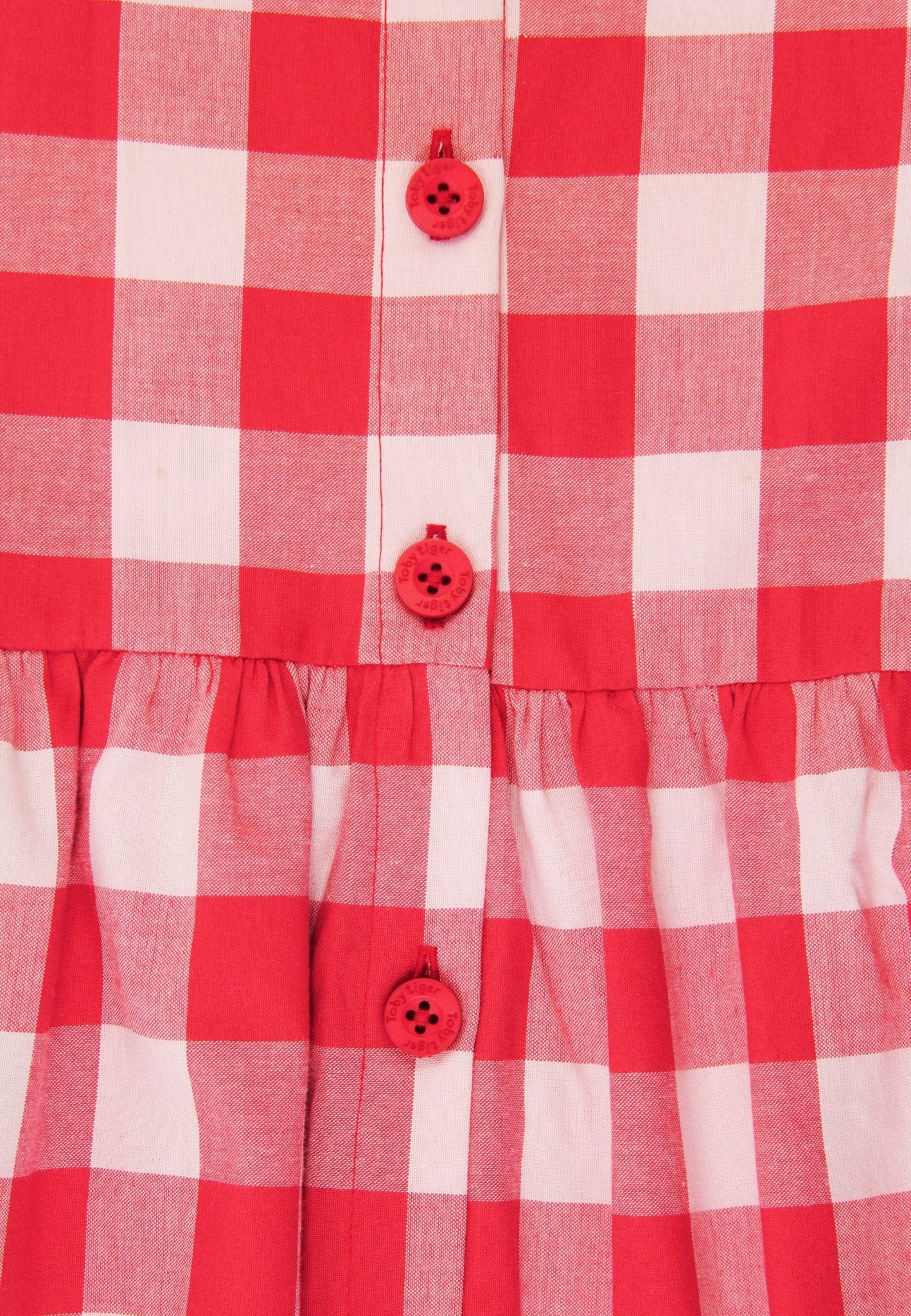 Bio - Baumwoll Kinder Kleid mit rotem großkarierten - Muster - Toby Tiger GmbH