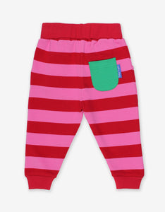 Striped baby pants made from organic cotton, pink and red stripes