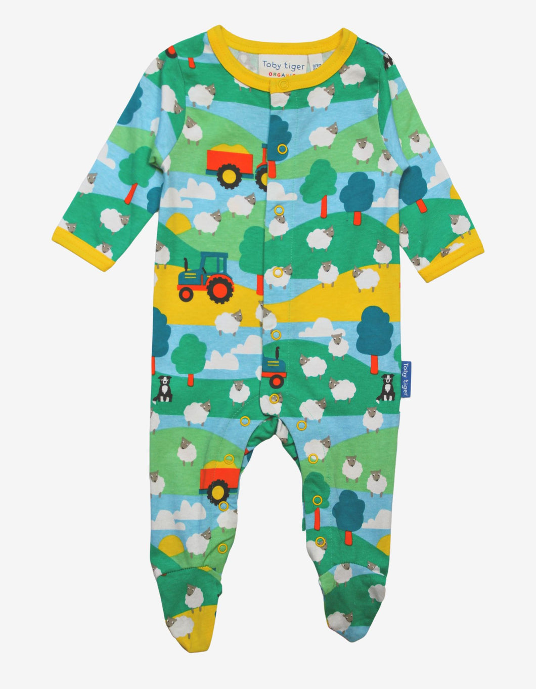 Pajamas, one-piece suits with a farm design made from organic cotton