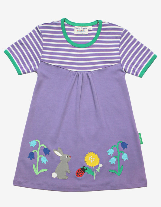Short-sleeved organic dress with spring appliqué